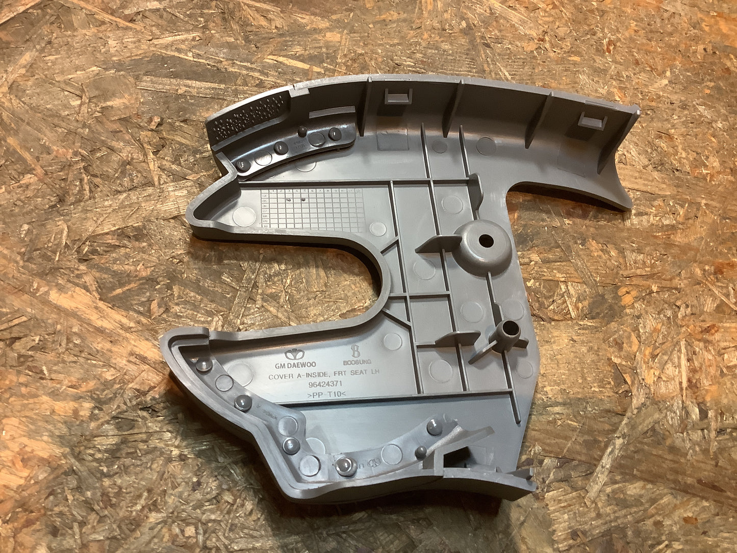 Chevrolet Aveo Abdeckung, Sitzverstellflosse, innen grau links Original GM NEU