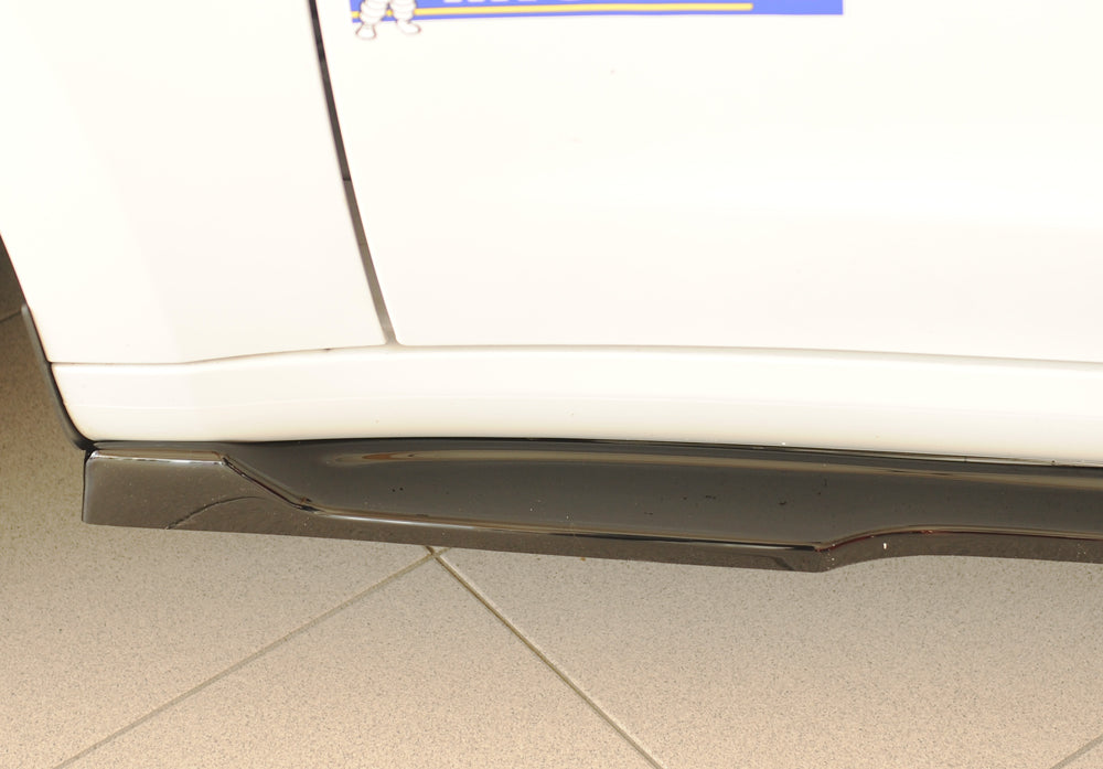 Tesla Model 3 (003) Rieger Seitenschwelleransatz links, für orig. Seitenschweller, ABS, schwarz glänzend,
inkl. Montagez...