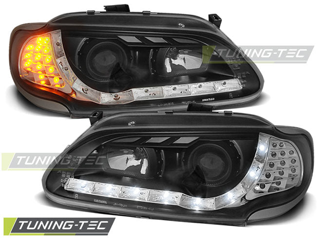 Tuning-Tec LED Tagfahrlicht Scheinwerfer für Renault Megane / Scenic 96-99 schwarz mit LED Blinker