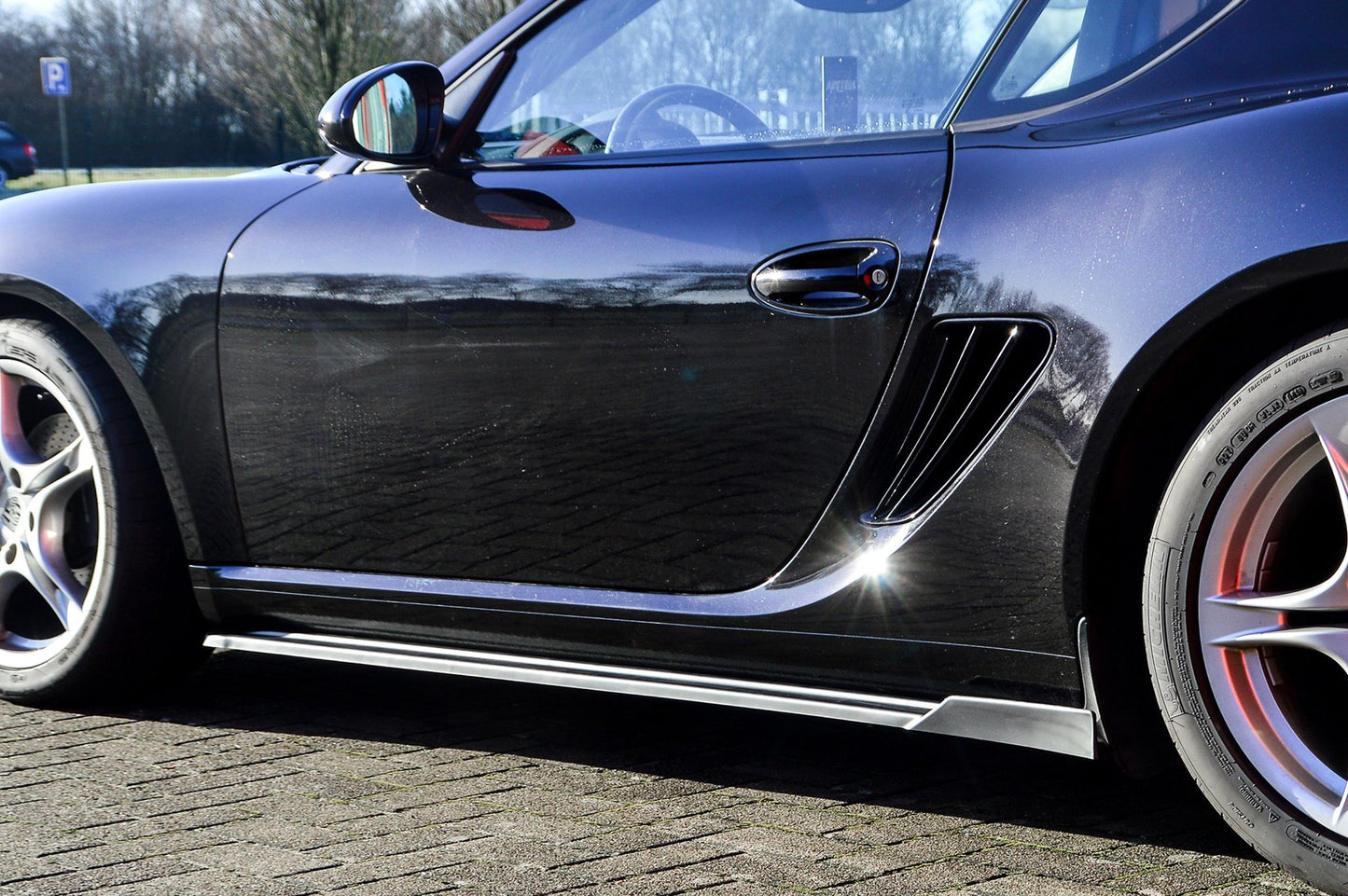 CUP Seitenschwellersatz mit Wing hinten Porsche Boxster 987 Carbon