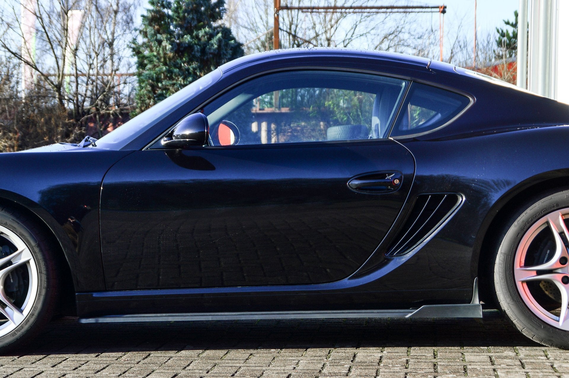 CUP Seitenschwellersatz mit Wing hinten Porsche Boxster 987 Carbon