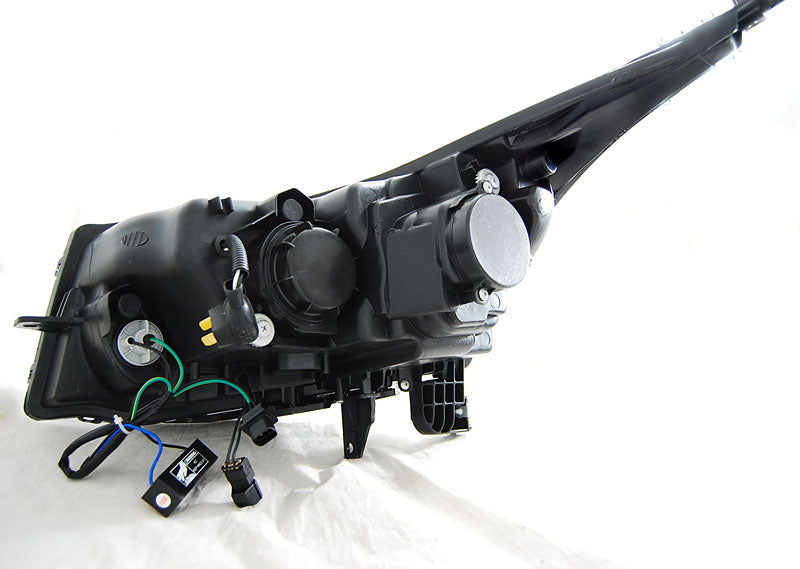 Tuning-Tec LED Tagfahrlicht Scheinwerfer für Chevrolet Cruze 09-12 schwarz mit LED Blinker