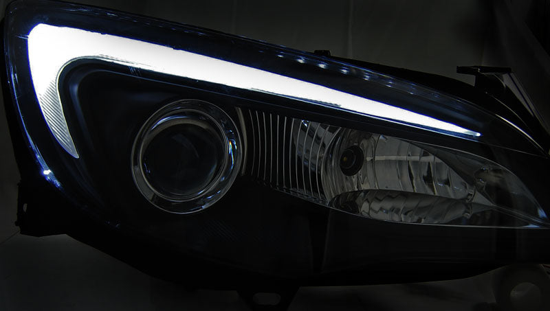 Tuning-Tec LED Tagfahrlicht Scheinwerfer für Opel Astra J 10-15 schwarz