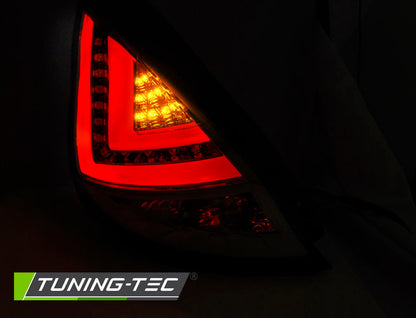 Tuning-Tec LED Lightbar Rückleuchten für Ford Fiesta MK7 08-12 rot/klar mit LED Blinker