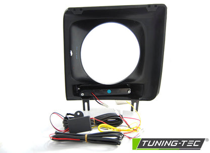 Tuning-Tec LED Tagfahrlicht Scheinwerferrahmen für Mercedes Benz G-Klasse W463/W461 01-12 schwarz (hochglanz)