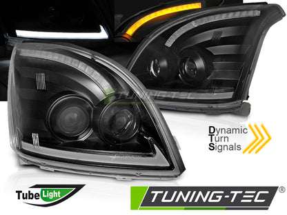 Tuning-Tec LED Tagfahrlicht Scheinwerfer für Toyota Land Cruiser 120 03-09 schwarz mit dynamischem LED Blinker