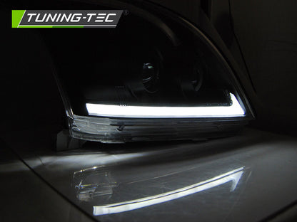 Tuning-Tec LED Tagfahrlicht Scheinwerfer für Toyota Land Cruiser 120 03-09 schwarz mit dynamischem LED Blinker