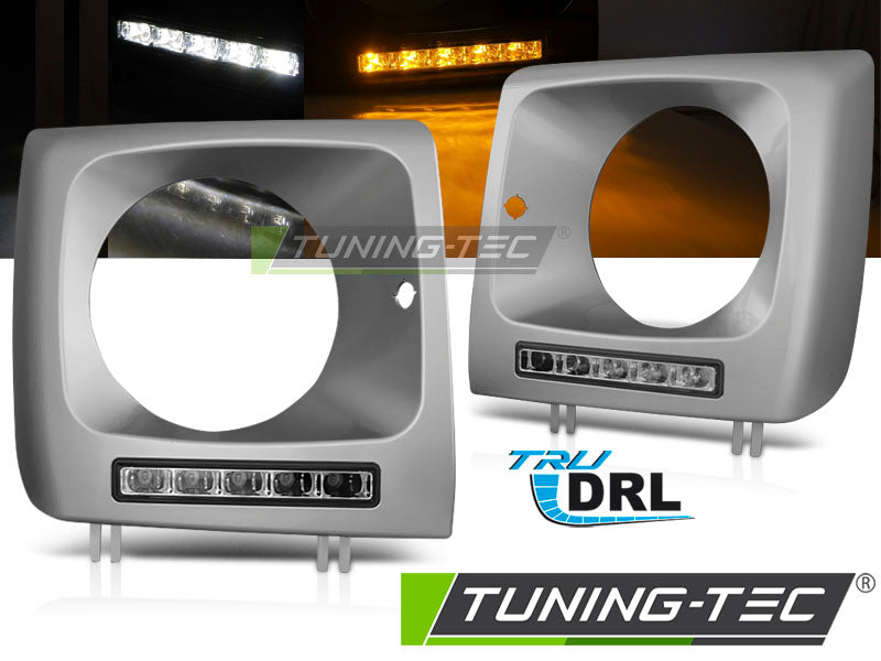 Tuning-Tec LED Tagfahrlicht Scheinwerferrahmen für Mercedes Benz G-Klasse W463/W461 92-06 silber