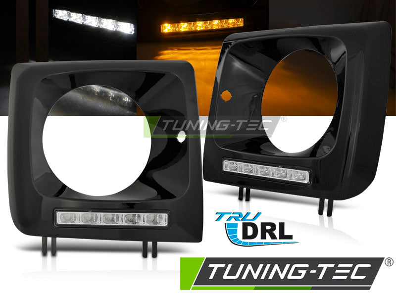 Tuning-Tec LED Tagfahrlicht Scheinwerferrahmen für Mercedes Benz G-Klasse W463/W461 01-12 schwarz (hochglanz)