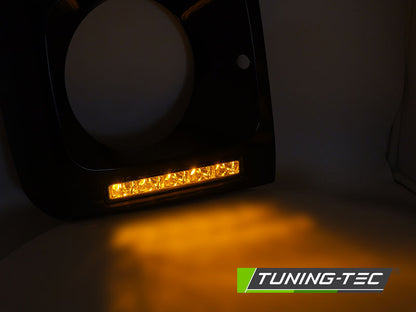 Tuning-Tec LED Tagfahrlicht Scheinwerferrahmen für Mercedes Benz G-Klasse W463/W461 01-12 schwarz (hochglanz)