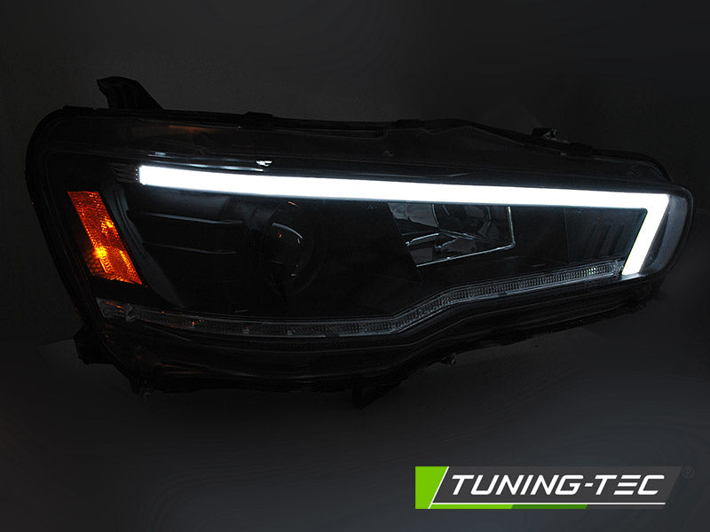 Tuning-Tec LED Tagfahrlicht Scheinwerfer für Mitsubishi Lancer VIII 08-16 schwarz mit dynamischem LED Blinker