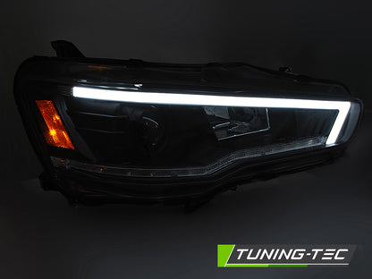 Tuning-Tec LED Tagfahrlicht Scheinwerfer für Mitsubishi Lancer VIII 08-16 schwarz mit dynamischem LED Blinker