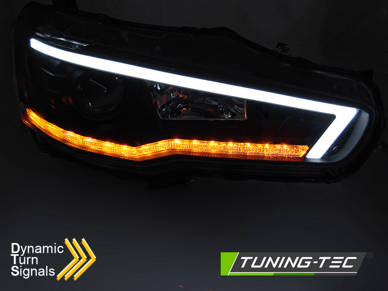 Tuning-Tec LED Tagfahrlicht Scheinwerfer für Mitsubishi Lancer VIII 08-16 schwarz mit dynamischem LED Blinker