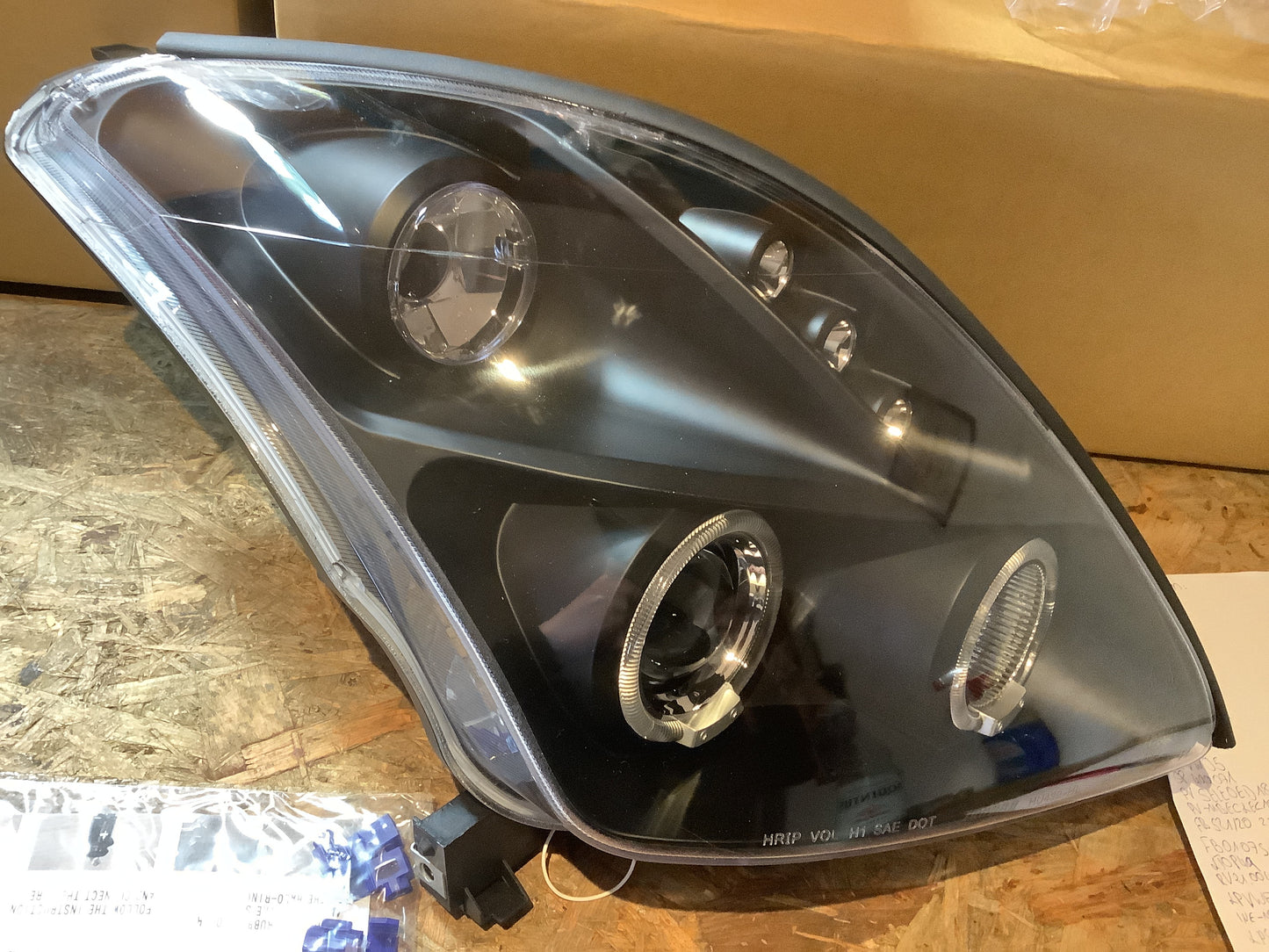Tuning-Tec LED Angel Eyes Scheinwerfer für Suzuki Swift 05-10 schwarz