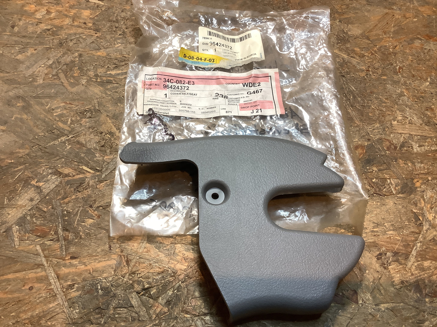 Chevrolet Aveo Abdeckung, Sitzverstellflosse, innen grau links Original GM NEU