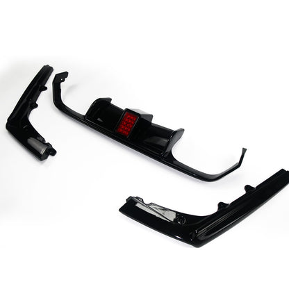 Heckstoßstange Diffusor Hochglanz Schwarz LED passend für BMW M3 F80 M4 F82 F83