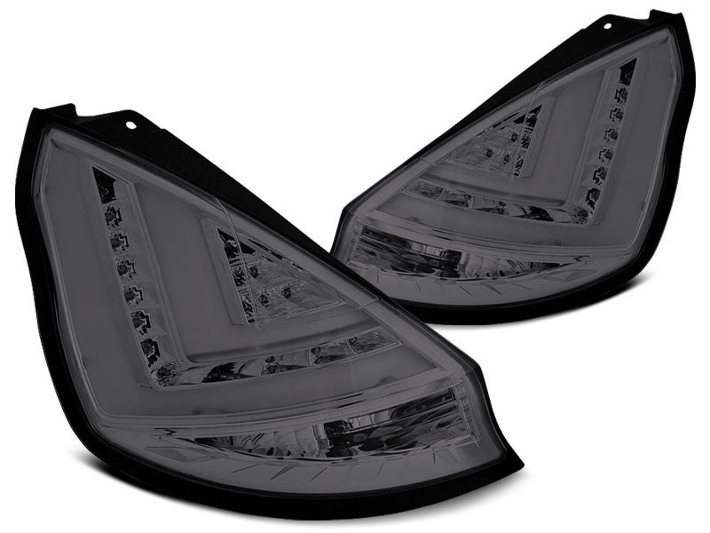 Tuning-Tec LED Lightbar Rückleuchten für Ford Fiesta MK7 08-12 rauch mit LED Blinker