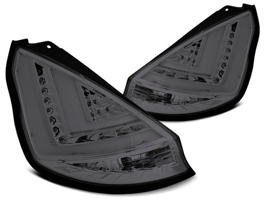 Tuning-Tec LED Lightbar Rückleuchten für Ford Fiesta MK7 12-16 rauch mit LED Blinker
