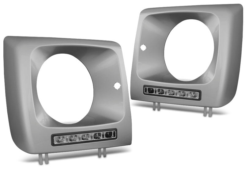 Tuning-Tec LED Tagfahrlicht Scheinwerferrahmen für Mercedes Benz G-Klasse W463/W461 92-06 silber