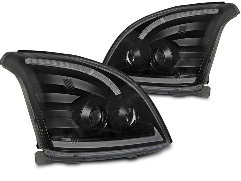 Tuning-Tec LED Tagfahrlicht Scheinwerfer für Toyota Land Cruiser 120 03-09 schwarz mit dynamischem LED Blinker