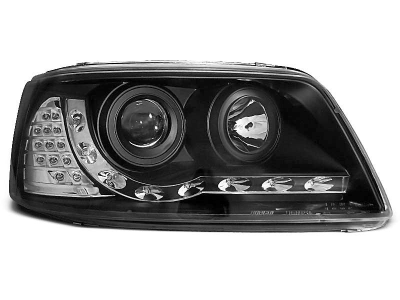 Tuning-Tec LED Tagfahrlicht Scheinwerfer für VW T5 03-09 schwarz mit LED Blinker