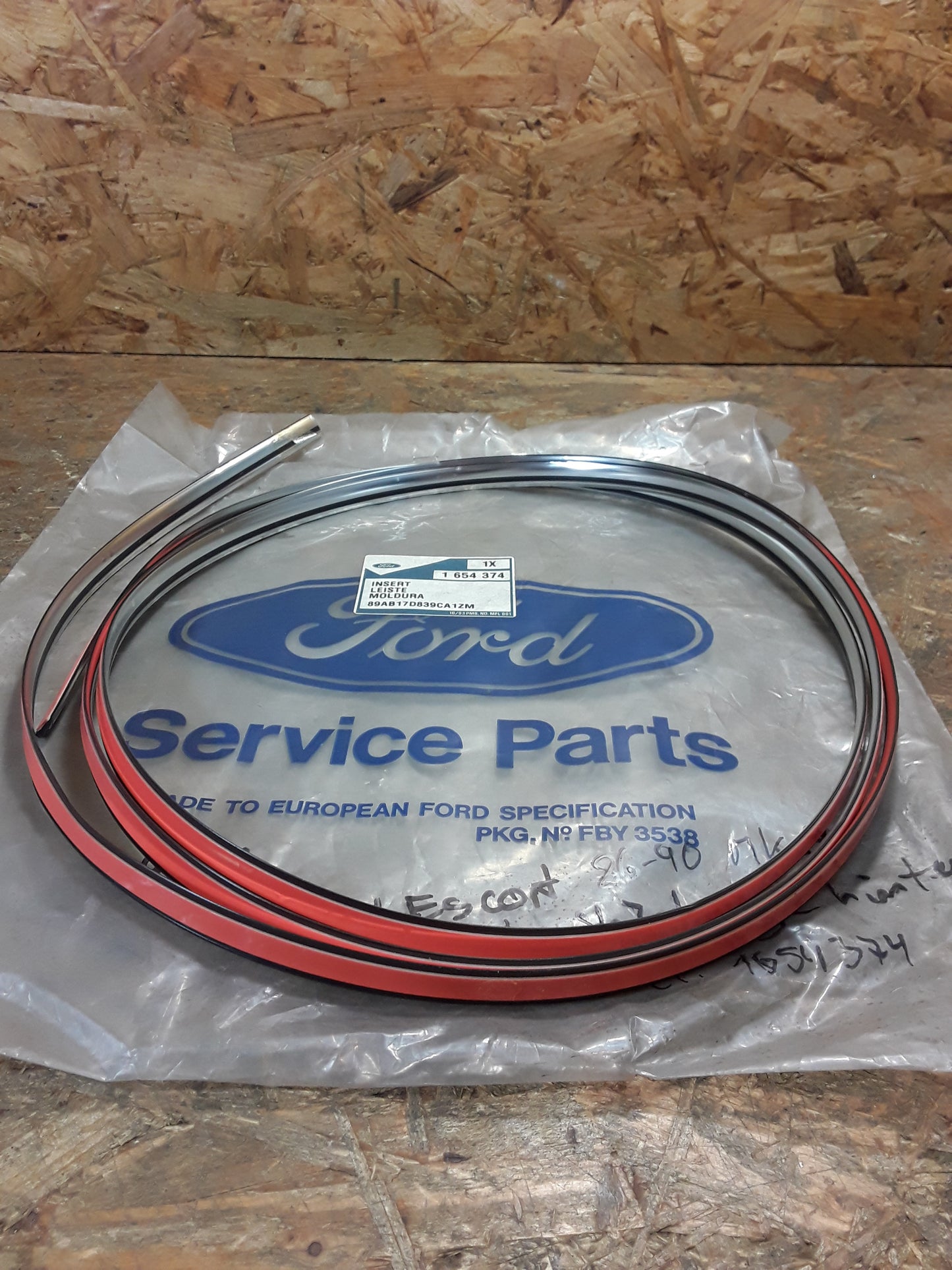 Ford Escort Bj 86-90 MK4 Zierleiste Stoßstange hinten original Ford NEU