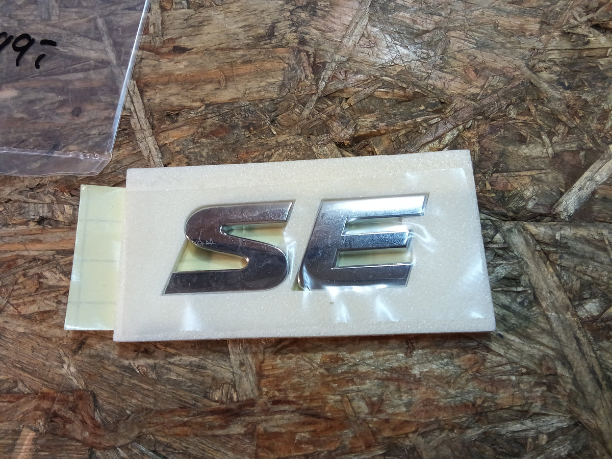 Chevrolet Aveo Kalos Emblem an Kotflügel "SE" original GM NEU