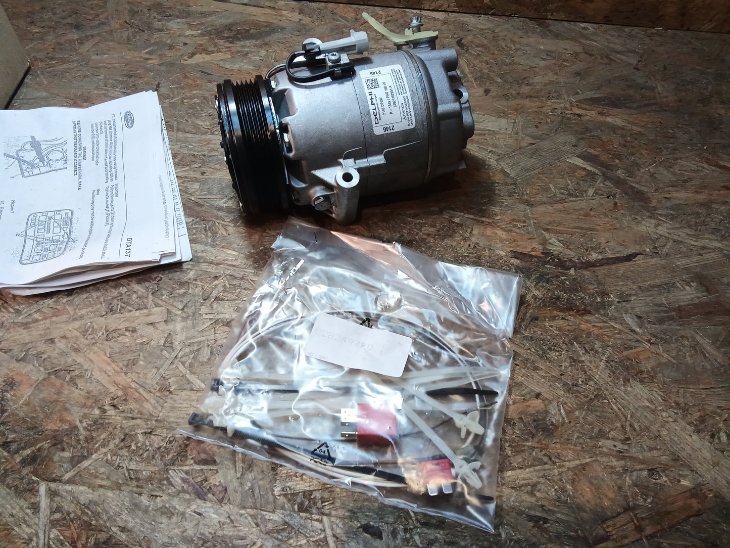 Astra H Klimakompressor original Delphi NEU
