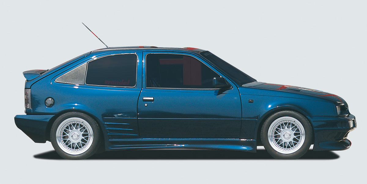 Opel Kadett E Rieger Spoilerstoßstange  mit Aussparung für NSW, GFK, 
Gutachten, Montagezubehör