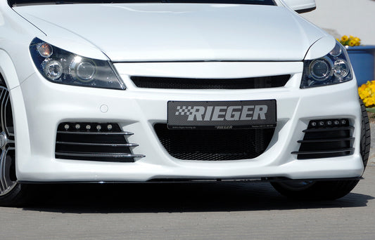 Opel Astra H Rieger Spoilerstoßstange  mit Aussparung für Tagfahrleuchten, ABS, für Fzg. mit OPC und ohne OPC, 
inkl. Montagezubehör, Alugitter, Lüftungsschacht, Lufteinlassblende, ABE