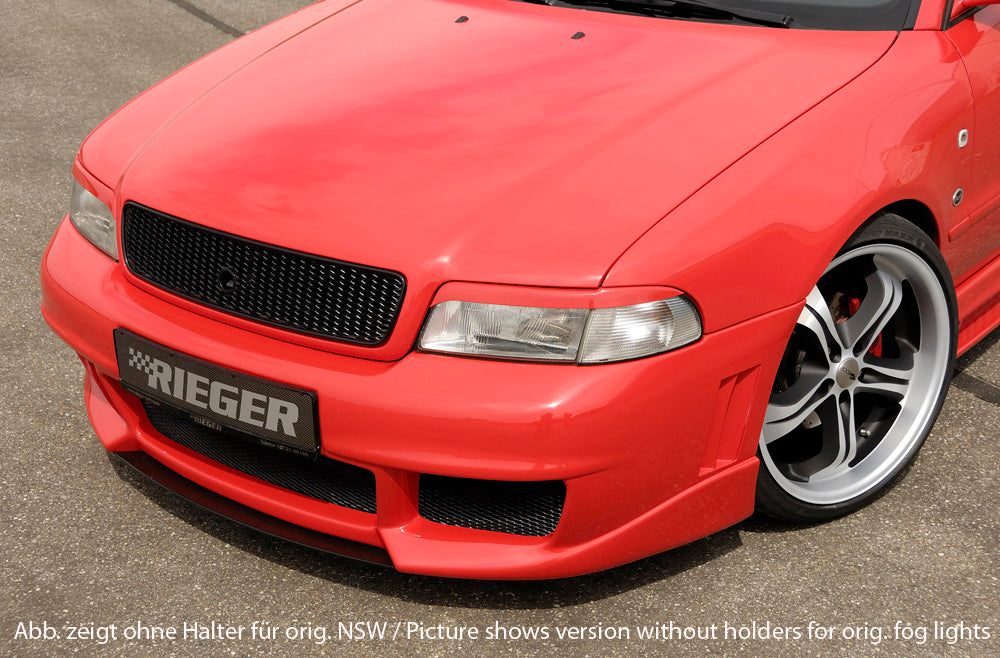 Audi A4 (B5) Rieger Spoilerstoßstange RS-Four-Look  mit großer Aussparung für Waschdüsen! (95x70mm) mit Halter f. orig. NSW, ABS, für Fzg. mit Scheinwerferreinigungsanlage, 
inkl. Alugitter, Montagezubehör, ABE