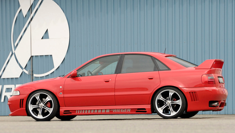 Audi A4 (B5) Rieger Spoilerstoßstange RS-Four-Look  mit großer Aussparung für Waschdüsen! (95x70mm) mit Halter f. orig. NSW, ABS, für Fzg. mit Scheinwerferreinigungsanlage, 
inkl. Alugitter, Montagezubehör, ABE