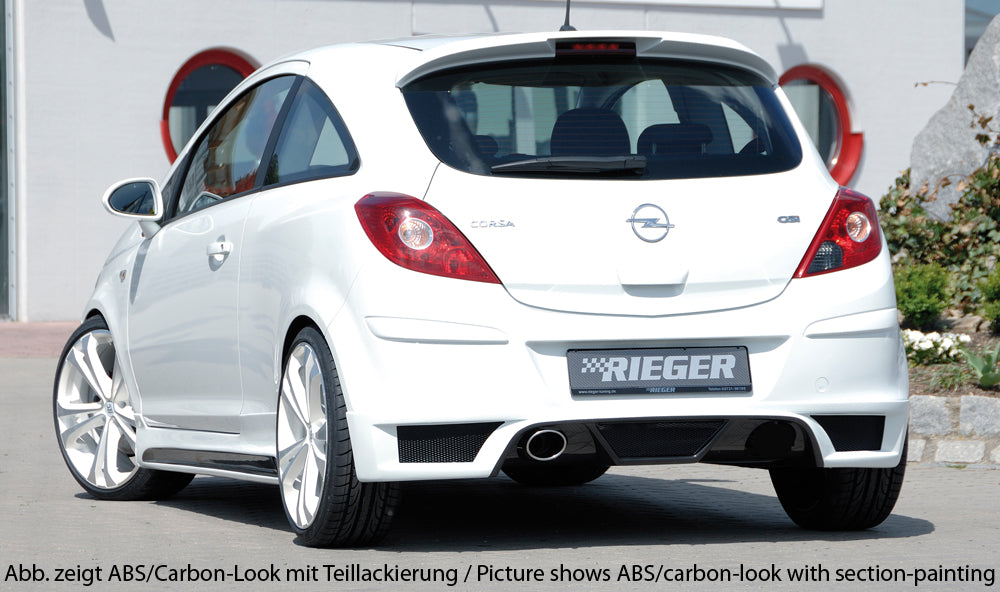 Opel Corsa D Rieger Heckschürzenansatz  für Endrohr li., ABS, 
inkl. Montagezubehör, Alugitter