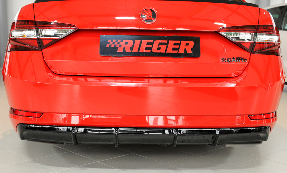 Skoda Superb III (3T/3V) Rieger Heckeinsatz ohne Aussparung für Endrohrblenden ABS, schwarz glänzend, für Fzg. mit Anhängekupplung, Einparkhilfe (PDC), 
inkl. Montagezubehör, Gutachten