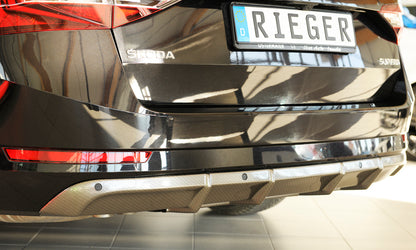 Skoda Superb III (3T/3V) Rieger Heckeinsatz ohne Aussparung für Endrohrblenden ABS, Carbon-Look, für Fzg. mit Einparkhilfe (PDC), 
inkl. Montagezubehör, Gutachten