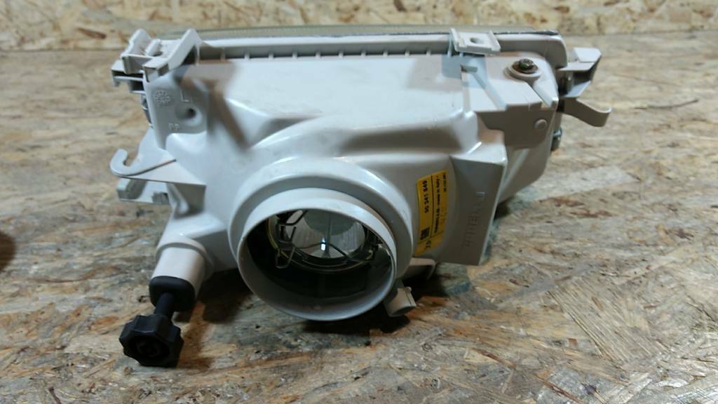 Original GM Opel Astra F Scheinwerfer Links NEU