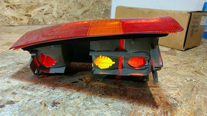 Kadett E Heckleuchte Fließheck links original GM Opel NEU