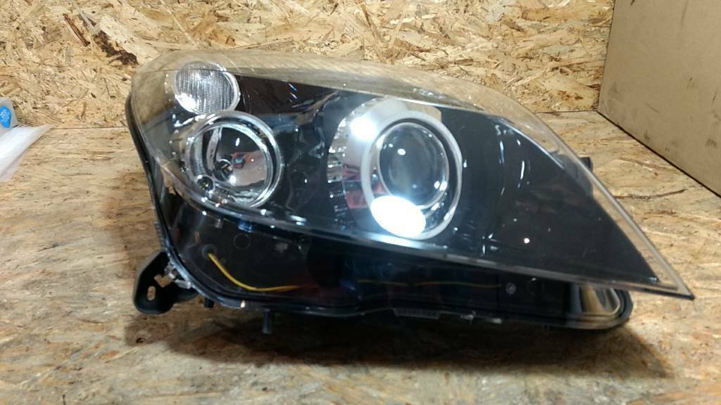 Astra H Hauptscheinwerfer rechts original GM Opel NEU