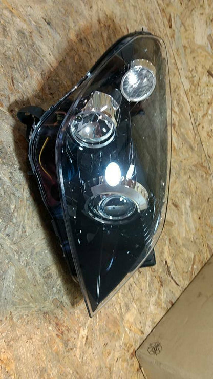 Astra H Hauptscheinwerfer rechts original GM Opel NEU