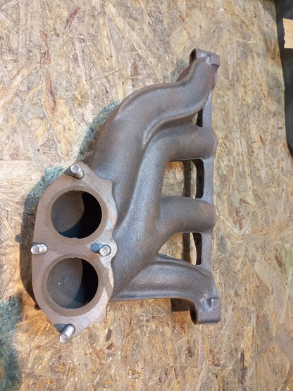 Kadett E Abgaskrümmer original GM Opel NEU