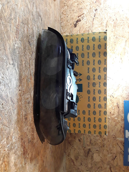 BMW 5er (E39) Hauptscheinwerfer links schwarz original Hella NEU