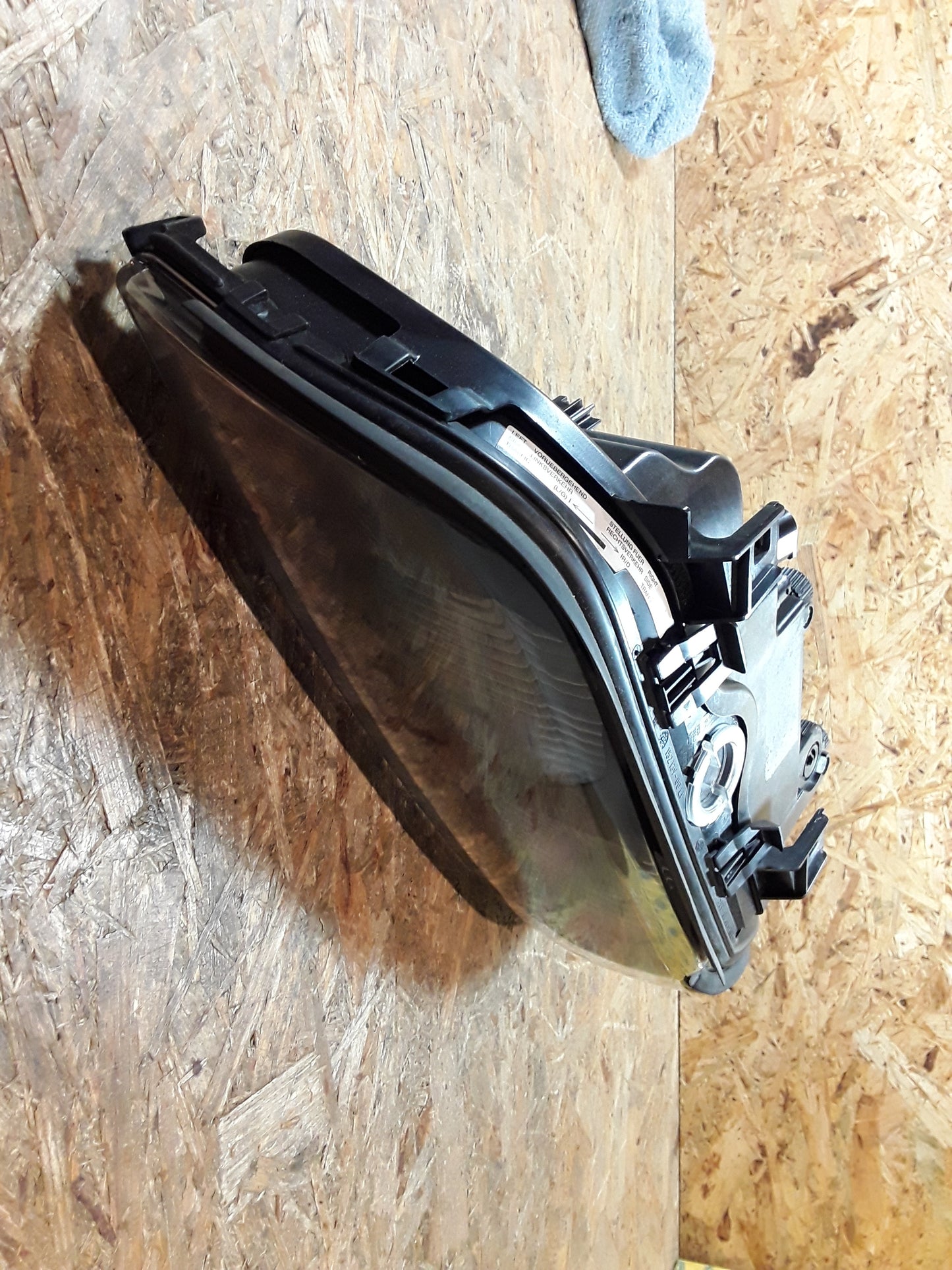 BMW 5er (E39) Hauptscheinwerfer links schwarz original Hella NEU