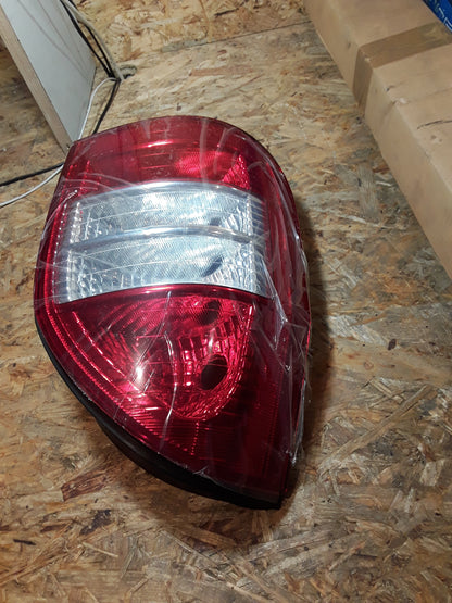 Corsa B Schrägheck 1,4 16V 90PS 94-00 BJ Rückleuchte links original GM Opel NEU