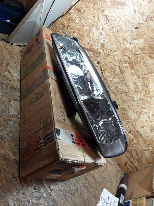 Vectra B Scheinwerfer links original GM Opel NEU