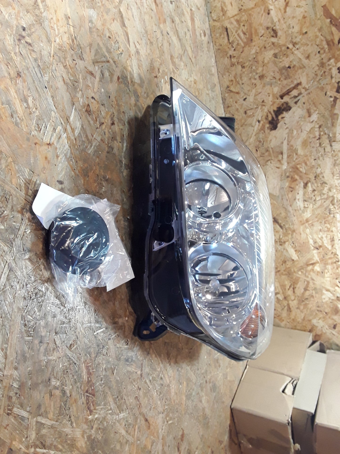 Astra H Hauptscheinwerfer links original GM Opel NEU