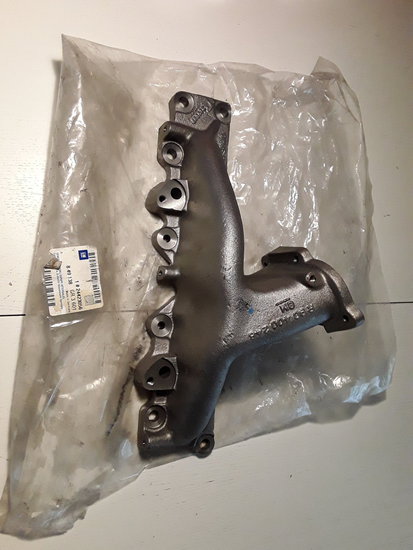 Calibra Frontera Omega 2,0 Auspuffkrümmer original GM Opel NEU