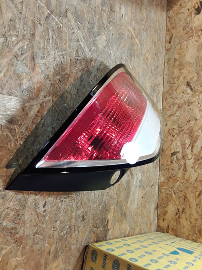 Astra H GTC Heckleuchte links original GM Opel NEU