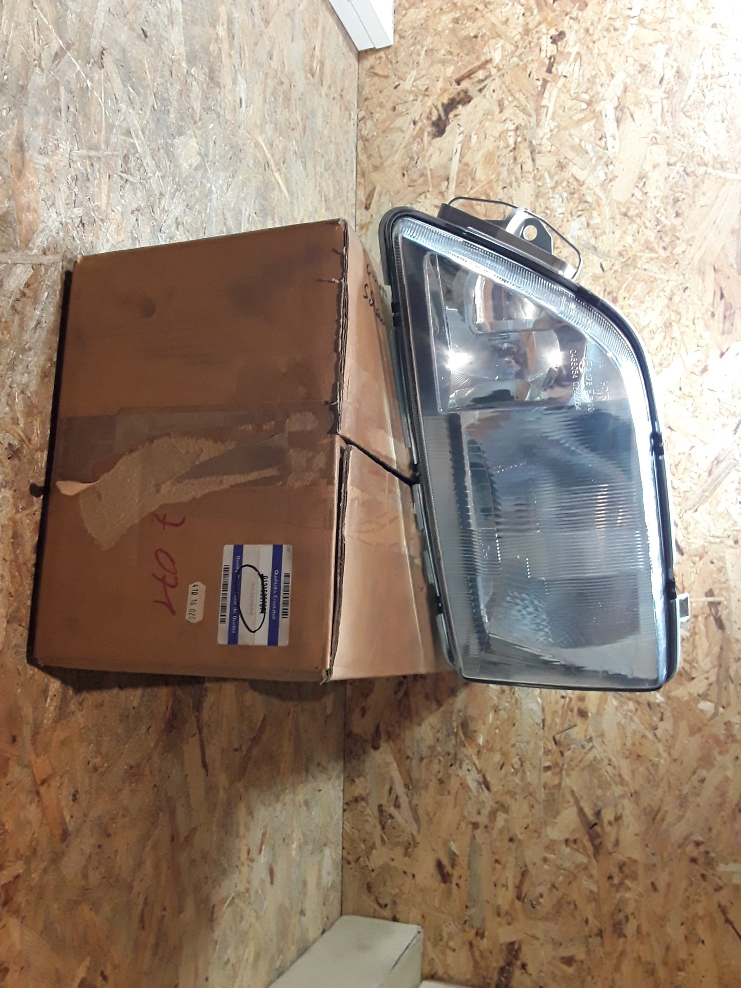 Omega A Scheinwerfer links original GM Opel NEU