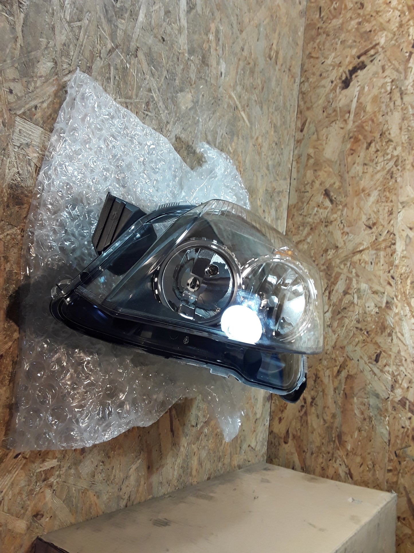 Astra H Scheinwerfer links original GM Opel NEU
