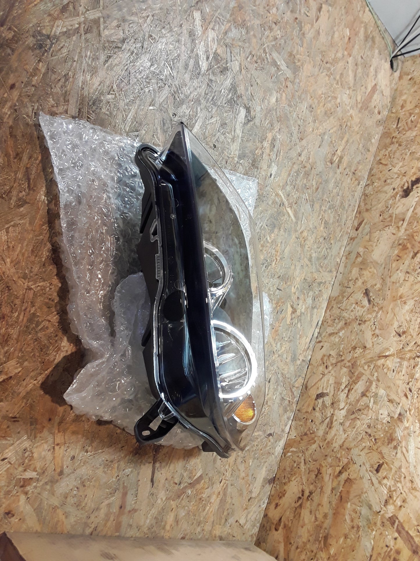 Astra H Scheinwerfer links original GM Opel NEU